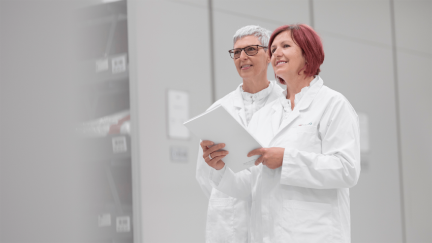 Terumo employees working in white outfits